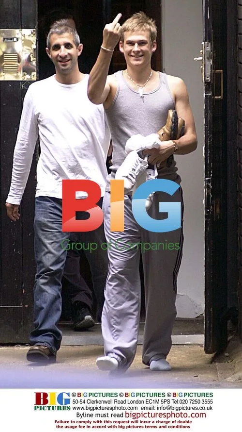 Lee Ryan Gives Finger Leaving Studio in Porsche