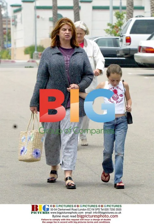 Kirstie Alley grocery shopping with family