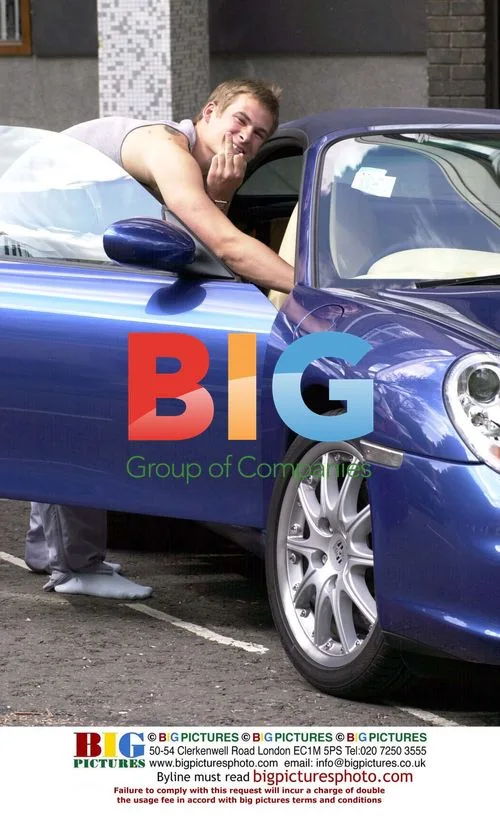 Lee Ryan Giving 'Finger' Leaving Studio in Blue Porsche