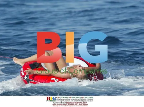 Glamour Model Ebony Enjoys Inflatable Donut Ride