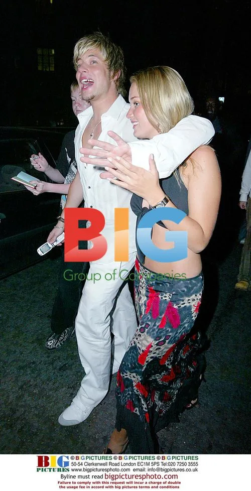 Duncan from Blue and female friend leaving 'Pirates' party