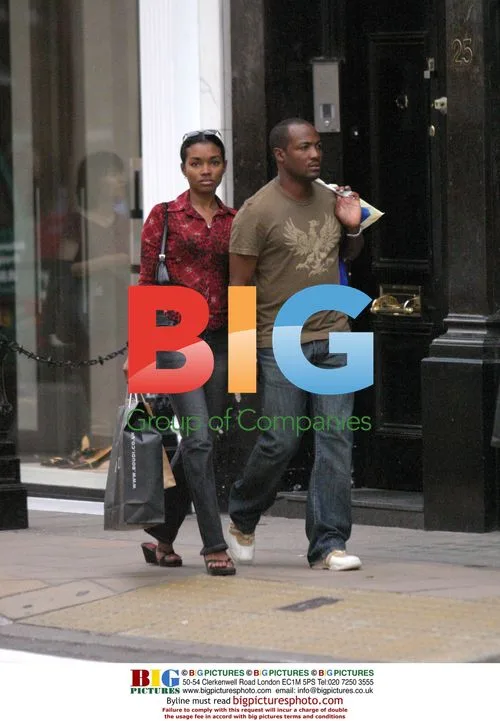 Brian Lara shopping with girlfriend in London