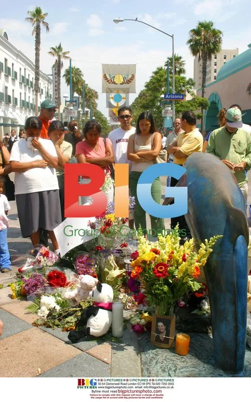 Mourners at memorial for victims of Santa Monica farmers market tragedy