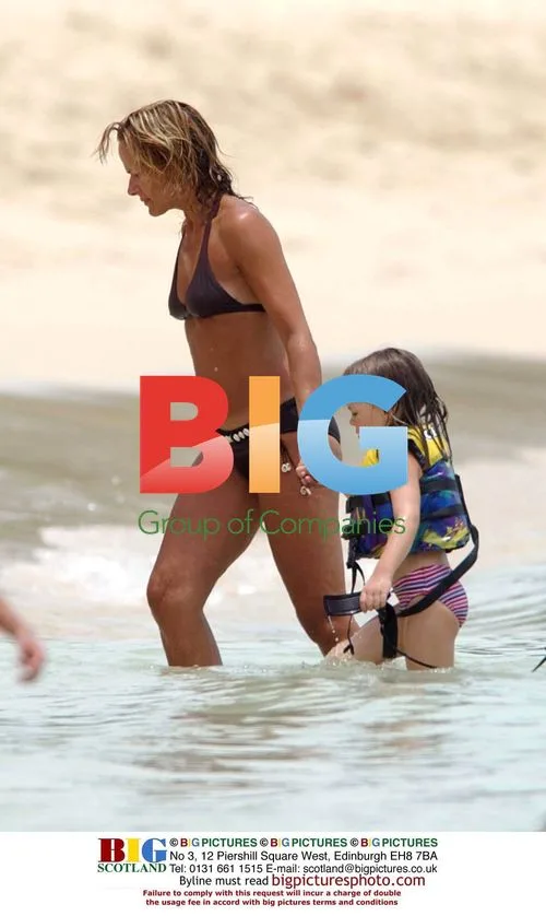 TV Presenter Carol Smilie and Kids Play in Barbados