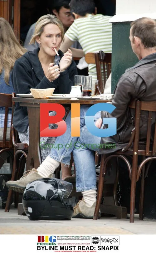 Saffron Aldridge Smoking at Cafe