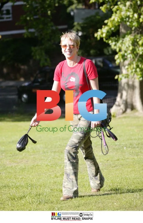 Sara Cox Walks Dog Snoop in London