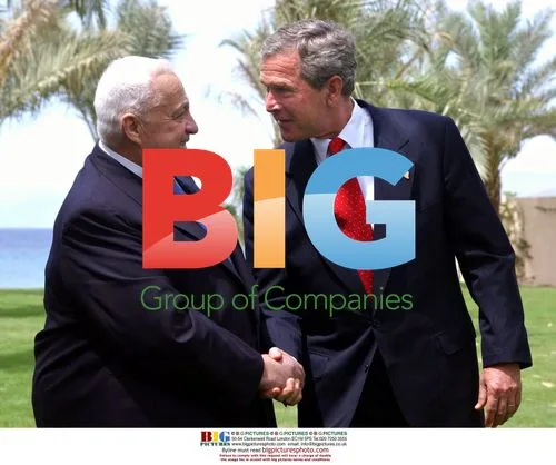Bush and Sharon Shake Hands in Jordan