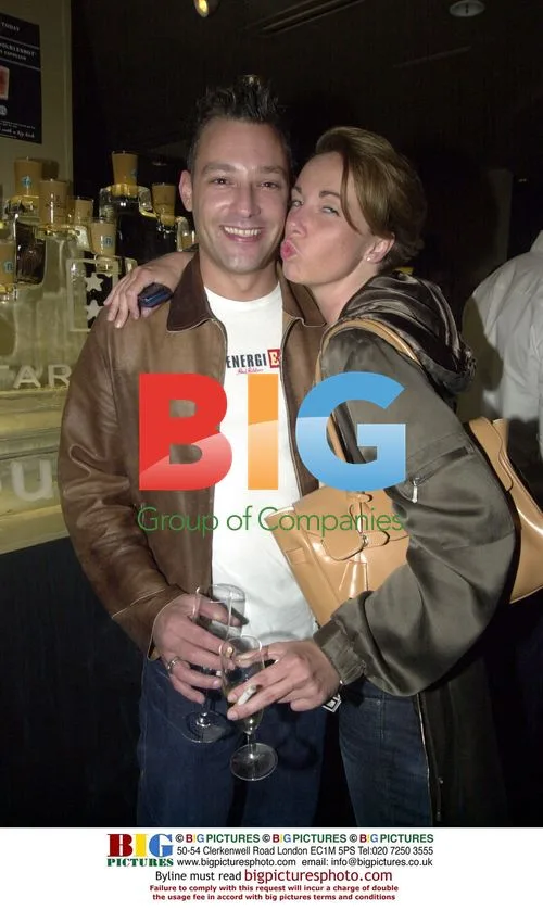 TV PRESENTER TOBY ANSTIS WITH ERIKA NORTH