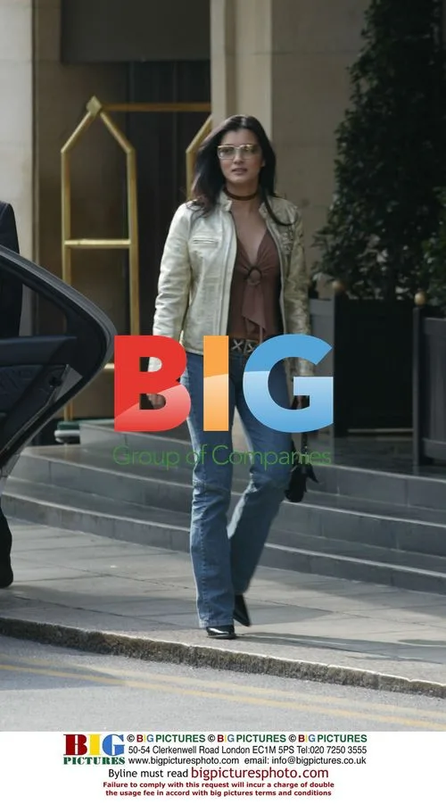 Kelly Hu Leaves London Hotel
