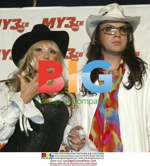 Masha Rasputina and Filipp Kirkorov at MuzTV Awards