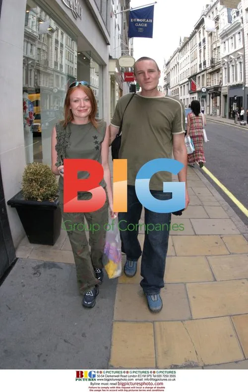 Sissy Rooney and boyfriend out in London