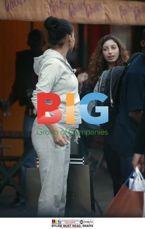 Singer MS Dynamite and boyfriend shopping
