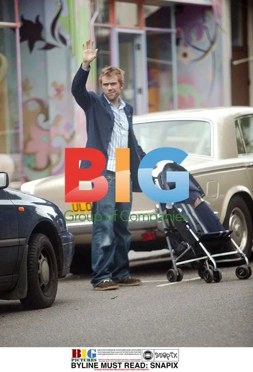 Blur Frontman Damon Albarn Pushing Buggy