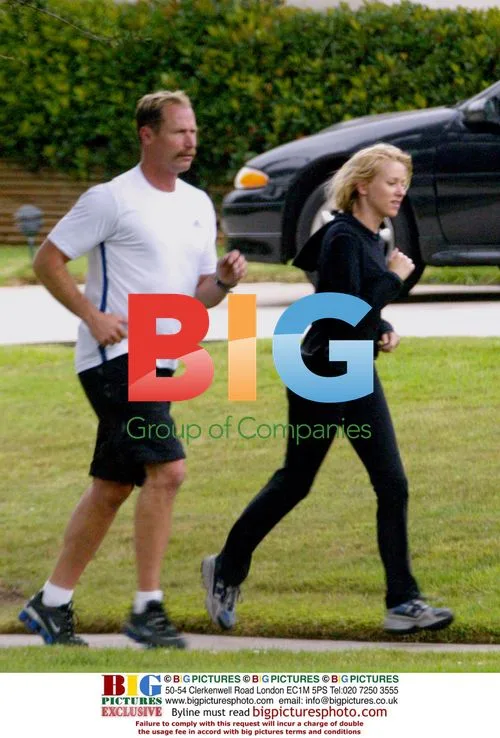 Naomi Watts jogging with trainer