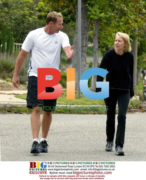 Naomi Watts jogging with trainer