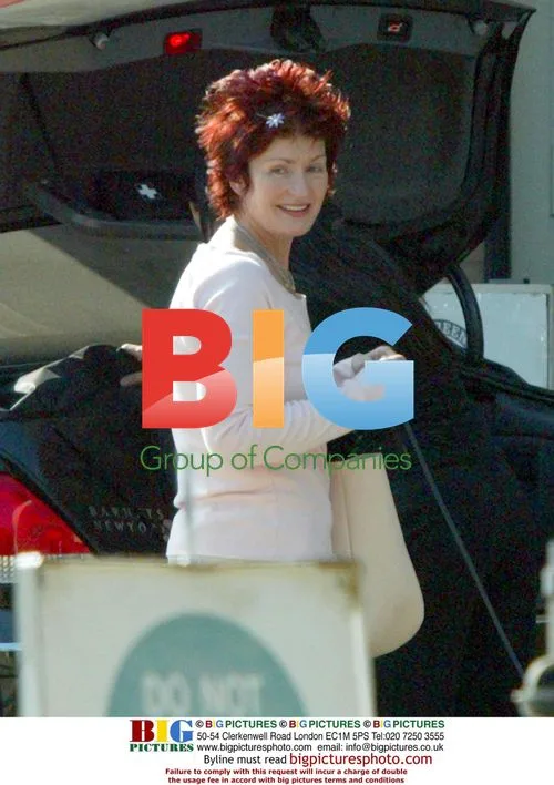 Sharon Osborne Shopping with Dog in Beverly Hills
