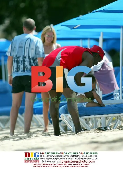 Jordan, Dwight Yorke & Baby Harvey on Caribbean Beach