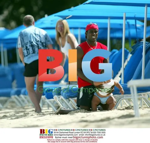 Jordan and Dwight Yorke Relax on Caribbean Beach