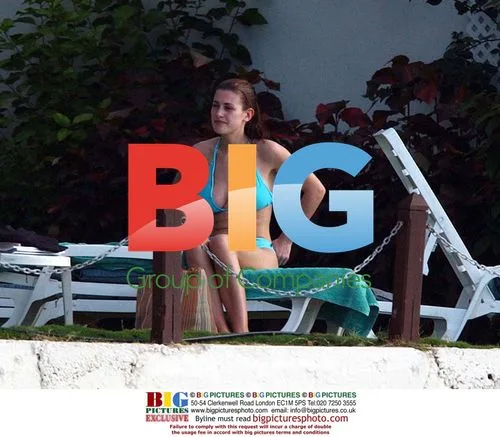 Kirsty Gallagher sunbathes in Barbados