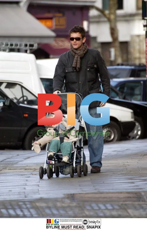 Scott Maslem with baby son in North London