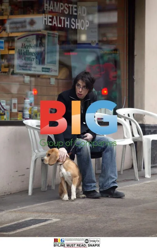 Sue Perkins Relaxes with Dog and Monk