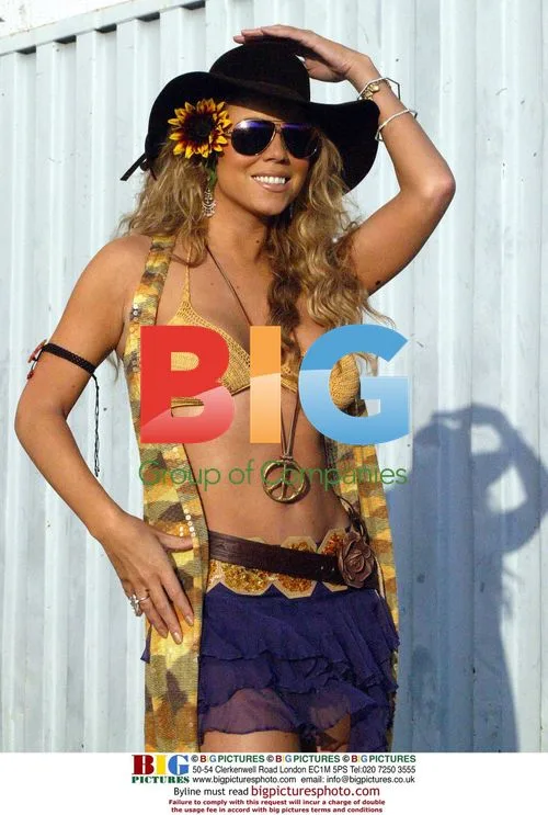 Mariah Carrey arrives with Joe Millionaire