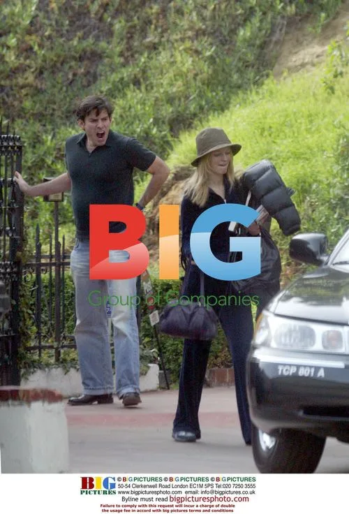 Heather Graham Leaves LAX with Boyfriend Chris Weitz