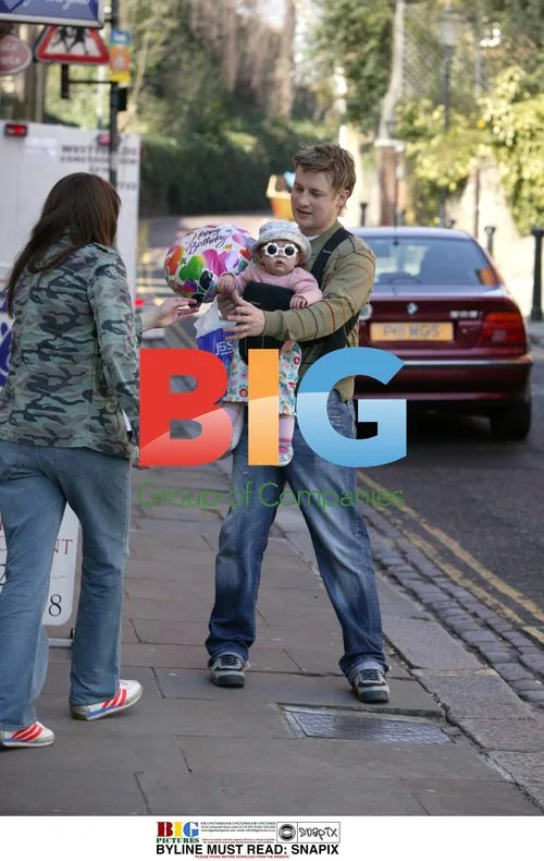 Jamie and Jules Oliver with baby Poppy