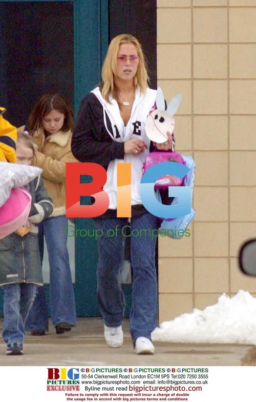 Kim Mathers and daughter Halle leaving school