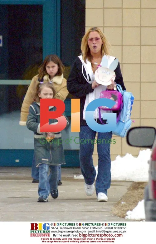 Kim Mathers and daughter Halle leaving school