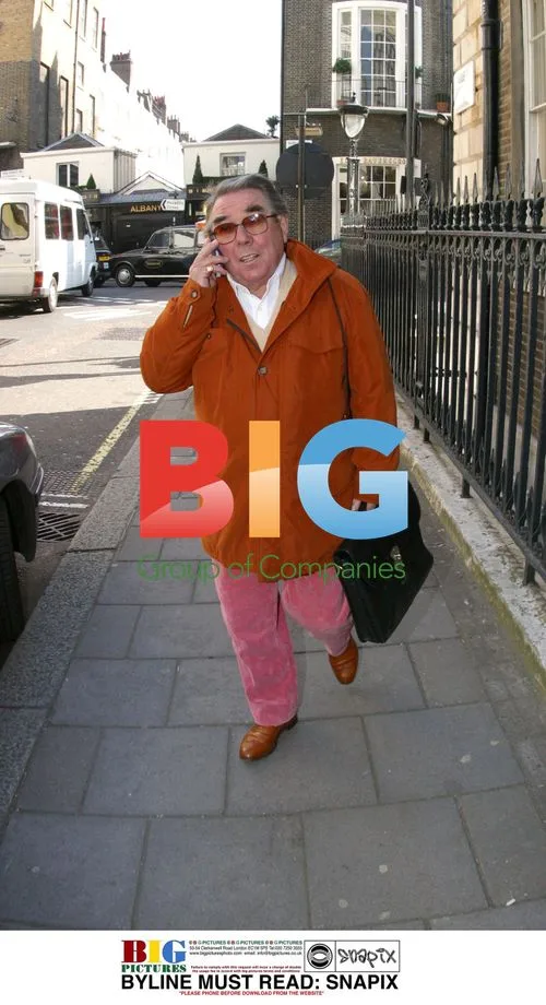 TV Comedian Ronnie Corbett Chatting on Phone