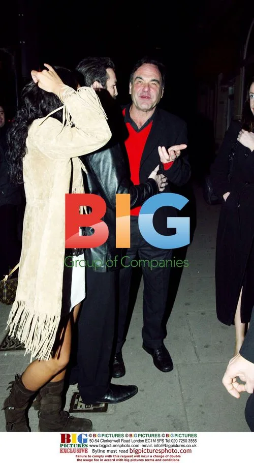 Oliver Stone and Gary Stretch Depart London Club