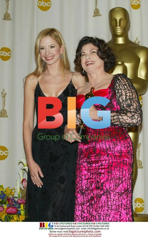 Mira Sorvino and Colleen Atwood at Oscars