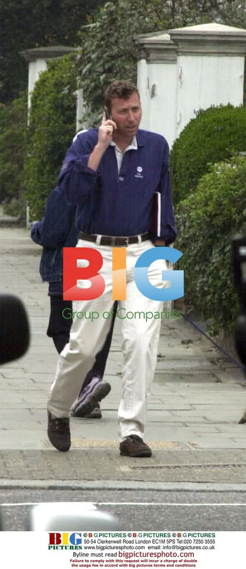 Michael Atherton Spotted on Phone in London
