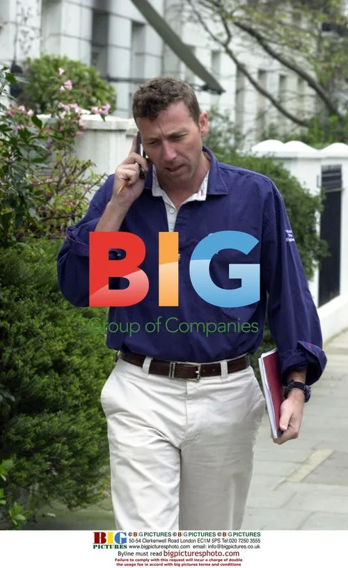 Michael Atherton on phone in London