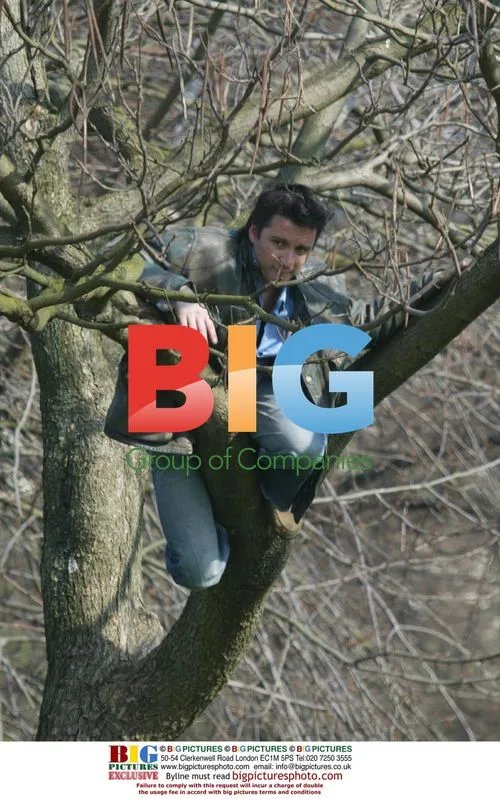 Alastair Mackenzie Climbs Tree in Hyde Park