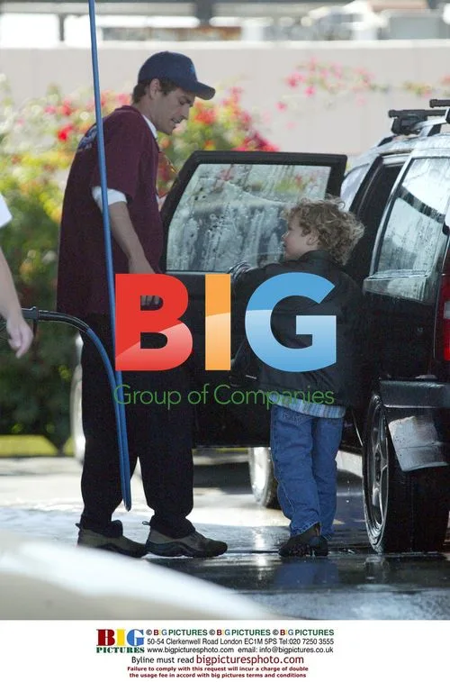 Luke Perry washes car with son Jack