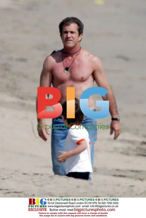 Mel Gibson Plays with Kids at Malibu Beach