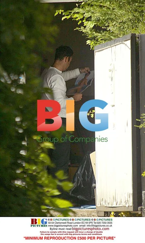 Mr Wright Looks at Porno Mags in Garage