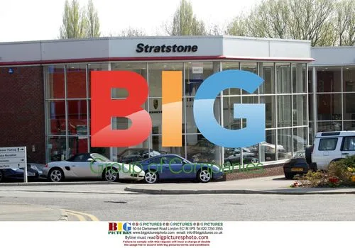 Will Mellor Examines Ferrari at Stratstone Garage