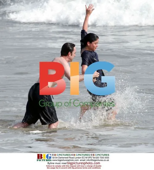 John Cusack Frolicking on Beach