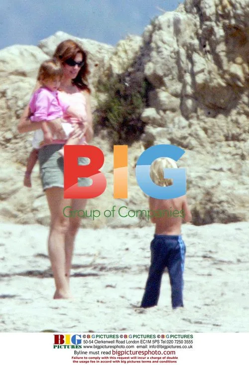 Cindy Crawford with family at the beach