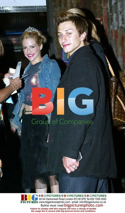 Briittany Murphy and date arriving at concert