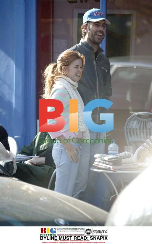 Isla Fisher & Sasha Baron Cohen in London