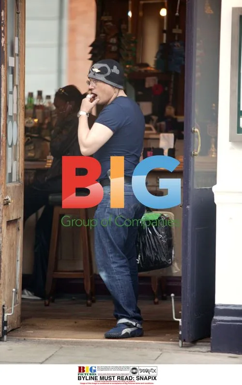 Singer Adam Ant shopping in London
