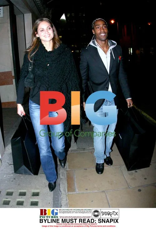 Singer Simon Webbe shops with friend