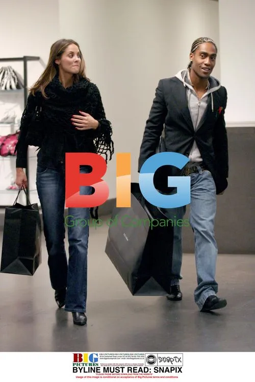 Simon Webbe of Blue shops with friend