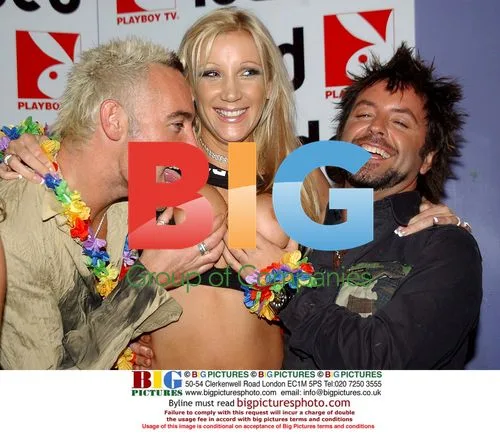 Glamour model with TV personalities at Loaded party