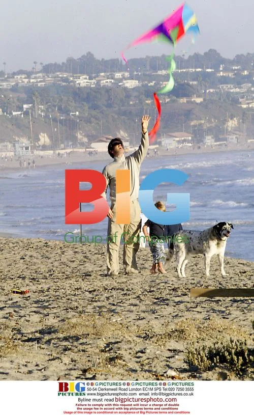 Pierce Brosman plays with family