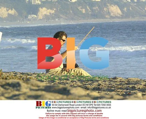 Pierce Brosman Plays with Family on Malibu Beach